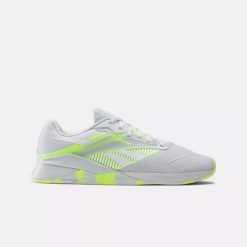 Sneakersy damskie Reebok Nano X4 buty sportowe treningowe tenisówki białe/żółte. Białe trampki i tenisówki damskie Reebok, bez wzorów, bez zapięcia. Za 449.00 zł.