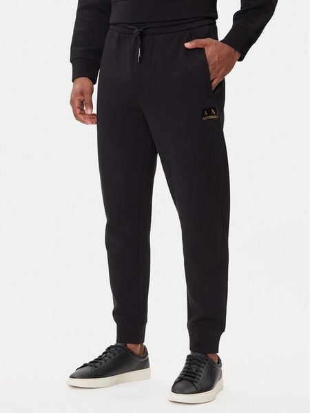 Armani Exchange Spodnie dresowe XM001886 AF10818 MC004 Czarny Slim Fit. Czarne spodnie sportowe męskie Armani Exchange, m, bez wzorów, z bawełny. Za 519.99 zł.