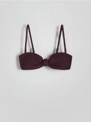 Góra od bikini - ciemnofioletowy. Fioletowe stroje kąpielowe damskie Reserved, bez wzorów. W wyprzedaży za 19.99 zł.