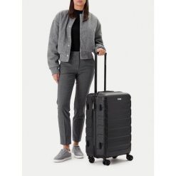 Walizka średnia GINO ROSSI. Czarne walizki damskie Gino Rossi, bez wzorów, średnie. Za 279.99 zł.