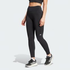 Legginsy Own the Run Full-Length. Niebieskie legginsy damskie Adidas, bez wzorów, z materiału. W wyprzedaży za 209.30 zł.