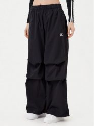 Adidas Spodnie dresowe Essentials Ripstop JD0785 Czarny Loose Fit. Czarne spodnie dresowe damskie Adidas, bez wzorów, z dresówki. Za 169.99 zł.