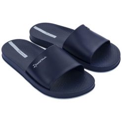 Klapki Ipanema Slide M 82832AJ331. Klapki męskie bez wzorów, z materiału, bez zapięcia. Za 218.61 zł.