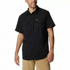 Koszula Columbia Utilizer™ II Solid Short Czarny. Czarne koszule męskie Columbia, l, bez wzorów, z materiału, bez kołnierzyka, bez ramiączek. Za 199.99 zł.
