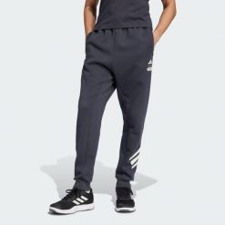 Spodnie Dresowe Adidas Star Wars The Mandalorian. Szare spodnie sportowe męskie Adidas, s, bez wzorów, z dresówki, na fitness i siłownię. Za 349.00 zł.