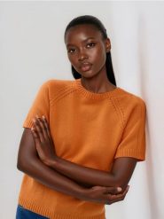 Bawełniany sweter - pomarańczowy. Brązowe swetry nierozpinane damskie Reserved, l, bez wzorów, z bawełny, bez kołnierzyka, bez ramiączek. Za 109.99 zł.