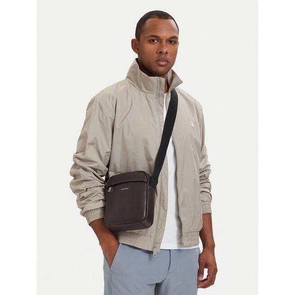 Saszetka Calvin Klein. Brązowe saszetki i nerki męskie Calvin Klein, bez wzorów. Za 256.99 zł.