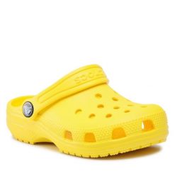 Klapki Crocs. Żółte klapki damskie Crocs, bez wzorów, bez obcasa, bez zapięcia. Za 189.99 zł.