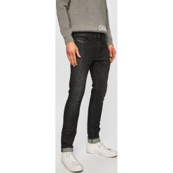 Diesel - Jeansy Thommer. Czarne jeansy męskie Diesel, z bawełny. Za 699.90 zł.
