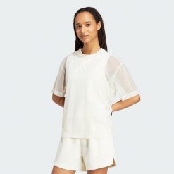 Koszulka Soft Lux Mesh. Białe bluzki damskie Adidas, m, bez wzorów, z meshu, sportowe, bez kołnierzyka, bez ramiączek. Za 179.00 zł.