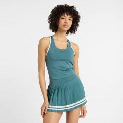 Koszulka damska New Balance WT51401NUS – niebieska. Niebieskie koszulki sportowe damskie New Balance, l, z aplikacjami, z materiału, bez ramiączek. Za 189.99 zł.