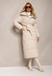 Jasnobeżowa Długa Kurtka Pikowana Płaszcz z Paskiem Adellesstta. Brązowe płaszcze damskie Renee, l, z aplikacjami, eleganckie, bez kołnierzyka, bez kaptura. Za 269.99 zł.