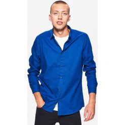 Gładka koszula slim fit - Turkusowy. Niebieskie koszule męskie Cropp, l, bez wzorów, bez kołnierzyka, bez ramiączek. Za 69.99 zł.