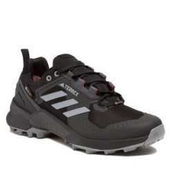 Trekkingi adidas. Czarne buty zimowe męskie Adidas, bez wzorów, z gore-texu, bez obcasa, bez zapięcia. Za 489.99 zł.