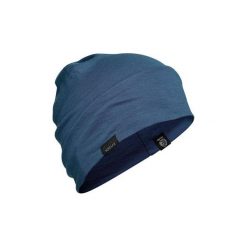 Czapka trekkingowa TREK 500 WOOL. Niebieskie czapki damskie FORCLAZ, bez wzorów, z materiału. Za 39.99 zł.