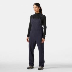 Kombinezony damskie Helly Hansen Awe. Fioletowe spodnie sportowe damskie Helly Hansen, na lato, bez wzorów, sportowe, trekkingowe. Za 611.50 zł.