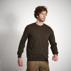 Sweter outdoor Solognac 100. Brązowe swetry męskie SOLOGNAC, l, bez wzorów, z elastanu, sportowe, bez kołnierzyka, bez ramiączek. W wyprzedaży za 39.99 zł.