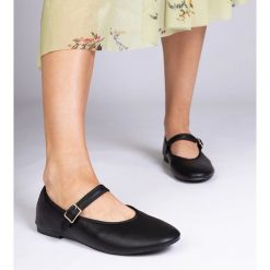 Czarne balerinki damskie ze sprzączką. Czarne balerinki damskie bez wzorów, z gumy, eleganckie, z okrągłym noskiem, bez obcasa, bez zapięcia. Za 75.95 zł.