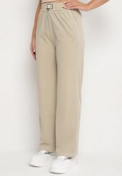 Beżowe Spodnie z Wiskozą o Prostym Kroju z Aplikacją w Talii Frolessa. Brązowe spodnie materiałowe damskie Born2be, z aplikacjami, z jeansu, eleganckie. Za 59.99 zł.
