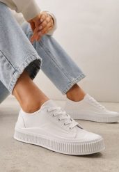 Białe Klasyczne Trampki na Żłobionej Podeszwie Levanatia. Białe trampki i tenisówki damskie Renee, bez wzorów, z jeansu, bez zapięcia. Za 69.99 zł.