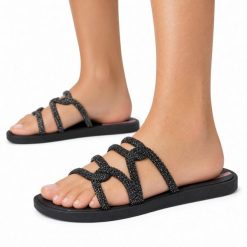 Klapki damskie Ipanema 27286 SOLAR GLOW SLIDE AD. Czarne klapki damskie Ipanema, na lato, bez wzorów, z materiału, klasyczne, bez obcasa, bez zapięcia. Za 69.00 zł.