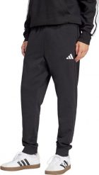 Spodnie męskie adidas Essentials Feel Cozy French Terry czarne JE3854 M. Czarne spodnie sportowe męskie Adidas, m, bez wzorów. Za 346.44 zł.