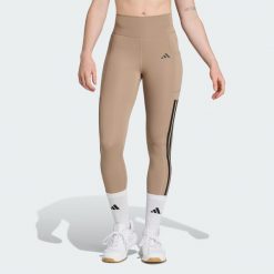 Legginsy Optime 3-Stripes Full Length. Brązowe legginsy damskie Adidas, bez wzorów. Za 279.00 zł.