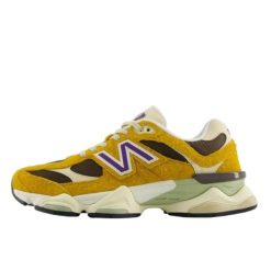 Buty do chodzenia dla dorosłych New Balance 9060 Butterscotch. Żółte obuwie sportowe damskie New Balance, bez wzorów, bez zapięcia, trekkingowe. Za 771.20 zł.