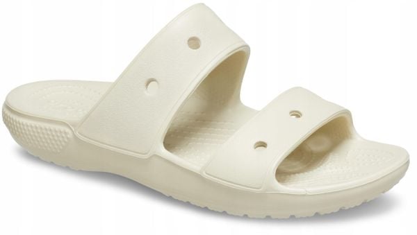 Klapki Dla Dorosłych Crocs Classic Sandal. Brązowe klapki damskie Crocs, bez wzorów, z materiału, bez obcasa, bez zapięcia. Za 118.99 zł.