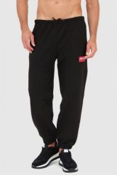 KENZO Czarne spodnie dresowe męskie, Rozmiar M. Czarne spodnie sportowe męskie Kenzo, l, bez wzorów, z dresówki. W wyprzedaży za 665.99 zł.