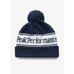Czapka zimowa Peak Performance Pow Hat - blue shadow/offwhite. Niebieskie czapki damskie Peak Performance, na zimę, bez wzorów. Za 161.99 zł.