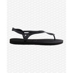 Klapki damskie Havaianas Luna. Czarne klapki damskie Havaianas, bez wzorów, z gumy, eleganckie, bez obcasa, bez zapięcia. Za 141.85 zł.