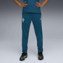 Młodzieżowe spodnie treningowe Portugalia PUMA. Niebieskia spodnie dresowe damskie Puma, bez wzorów, młodzieżowe. Za 279.00 zł.