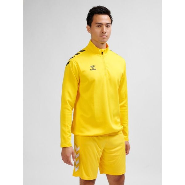 Bluza 1/2 zip Hummel Core XK. Brązowe bluzy damskie Hummel, bez wzorów, bez kaptura, do piłki ręcznej. Za 230.00 zł.