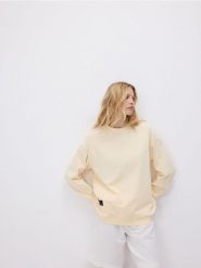 Bawełniana bluza z aplikacją - jasnożółty. Żółte bluzy damskie Reserved, l, z aplikacjami, z bawełny, bez ramiączek, bez kaptura. W wyprzedaży za 49.99 zł.