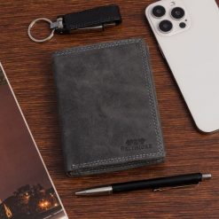 Portfel męski skórzany mały pionowy klasyczny czarny RFiD Beltimore S48. Czarne portfele męskie bez wzorów. Za 59.90 zł.