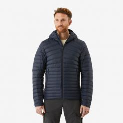 Kurtka puchowa turystyczna męska Forclaz MT100 -5°C. Niebieskie kurtki męskie FORCLAZ, l, bez wzorów, z materiału, sportowe, z kapturem. Za 299.99 zł.