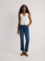 Jeansy mini flare - granatowy. Niebieskie jeansy damskie Reserved, bez wzorów, z bawełny. W wyprzedaży za 79.99 zł.