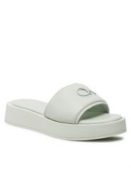 Calvin Klein Klapki Flatform Slide Relock Lth HW0HW02049 Zielony. Zielone klapki damskie Calvin Klein, bez wzorów, ze skóry, bez obcasa, bez zapięcia. Za 659.99 zł.