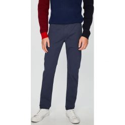 Lee - Spodnie. Niebieskie eleganckie spodnie męskie Lee, bez wzorów, z bawełny. W wyprzedaży za 269.90 zł.
