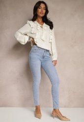 Jasnoniebieskie Jeansy z Bawełny Typu Slim Felindrae. Niebieskie jeansy damskie Renee, bez wzorów, z bawełny, eleganckie. Za 49.99 zł.