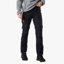 Spodnie Wędrówki damska Swedemount Lofoten Stretch Zip-Off Pants wodoodporna. Czarne spodnie sportowe damskie SWEDEMOUNT, bez wzorów, z tkaniny, sportowe, trekkingowe. Za 449.99 zł.
