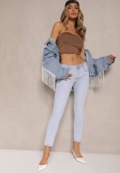Jasnoniebieskie Jeansy o Kroju Skinny Low Waist Kolanilia. Niebieskie jeansy damskie Renee, bez wzorów, z jeansu, eleganckie, z obniżonym stanem. Za 99.99 zł.