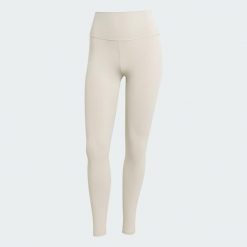 Legginsy All Me 7/8. Brązowe legginsy damskie Adidas, bez wzorów, z elastanu. Za 238.25 zł.