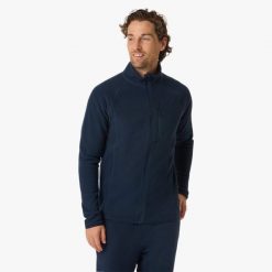 Bluza Polarowa Rozpinana turystyka męska Swedemount Geilo Fleece Full Zip II. Niebieskie bluzy sportowe męskie SWEDEMOUNT, na zimę, m, bez wzorów, z polaru, bez kaptura, narciarskie. W wyprzedaży za 116.99 zł.
