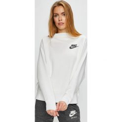 Nike Sportswear - Bluza. Białe bluzy damskie Nike Sportswear, l, bez wzorów, z bawełny, bez ramiączek, bez kaptura. W wyprzedaży za 199.90 zł.