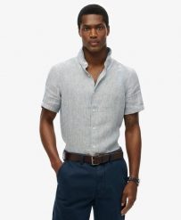 Superdry Koszula Vacation lniana krótki rękaw Navy Ticking Linen. Niebieskie koszule damskie Superdry, s, bez wzorów, z tkaniny, bez kołnierzyka, bez ramiączek. Za 322.70 zł.