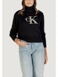 Calvin Klein Jeans Sweter CHENILLE MONOLOGO SW Czarny Casual Fit. Czarne swetry nierozpinane damskie Calvin Klein Jeans, xs, bez wzorów, z jeansu, casualowe, bez kołnierzyka, bez ramiączek. Za 429.99 zł.