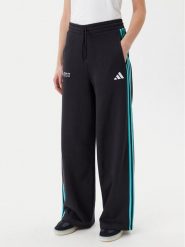 Adidas Spodnie dresowe Mercedes - AMG Petronas Formula One Team DNA JV5432 Czarny Regular Fit. Czarne spodnie dresowe damskie Adidas, bez wzorów, z bawełny. Za 219.99 zł.