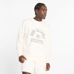Bluza męska New Balance MT43507SST – beżowa. Brązowe bluzy męskie New Balance, l, bez wzorów, z bawełny, klasyczne, bez ramiączek, bez kaptura. Za 149.99 zł.